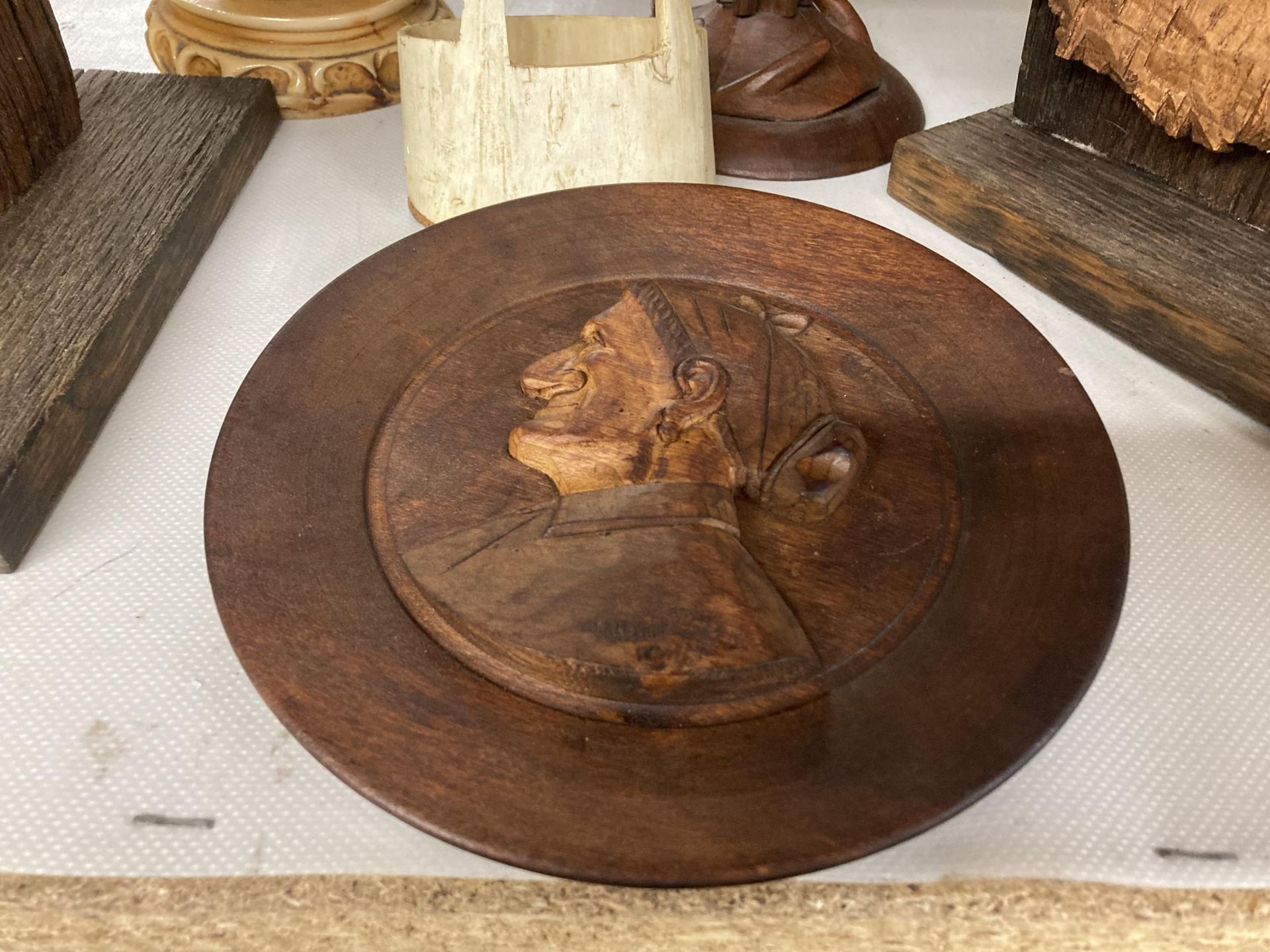 A WOODEN CARVED PLAQUE OF A FISHERMAN ON A STAND, WOODEN LOTUS LAMP, A LARGE HORN BIRD, AN - Image 9 of 9