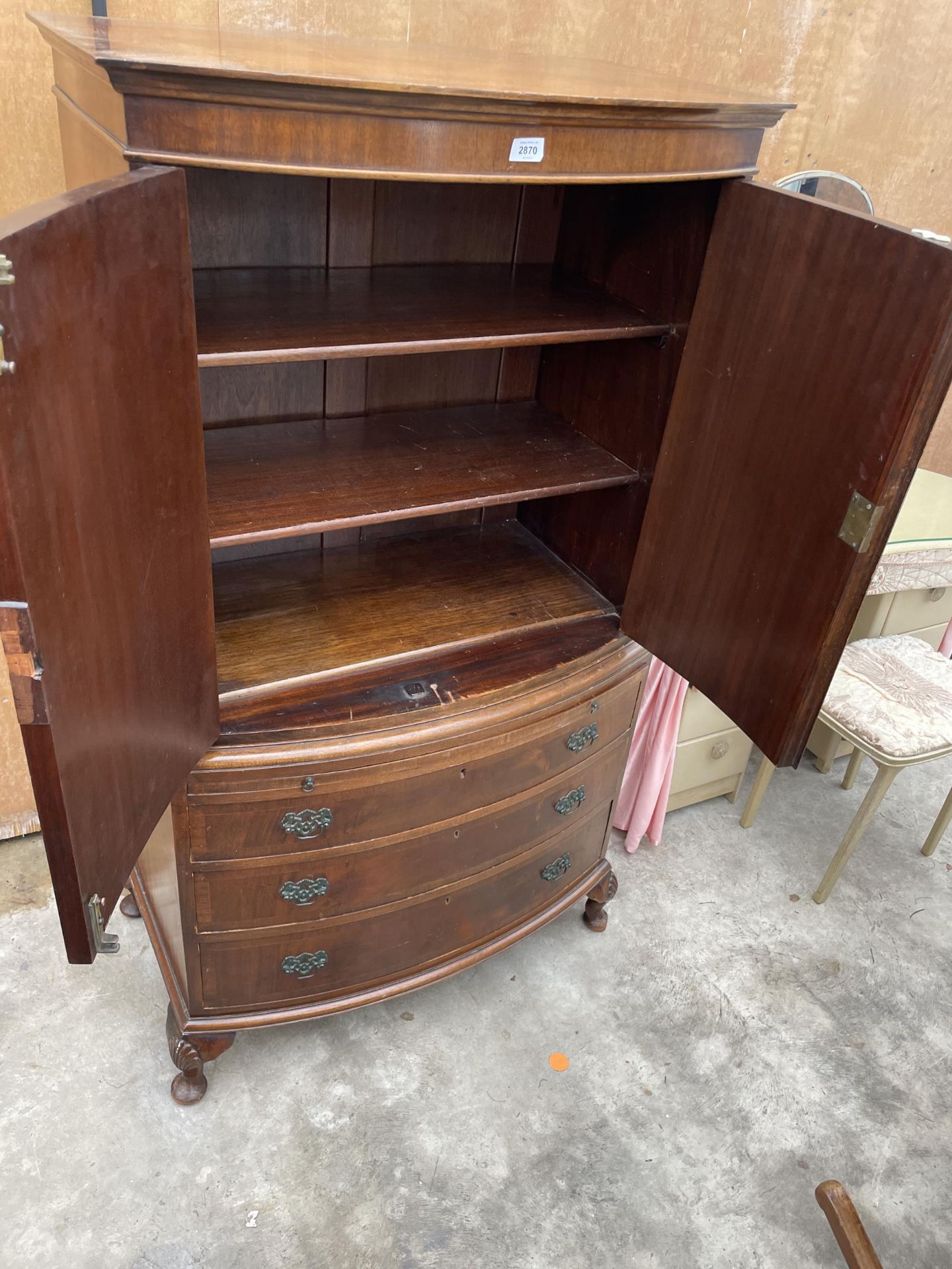 A 19TH CENTURY MAHOGANY AND CROSSBANDED BOWFRONTED PRESS STYLE CUPBOARD WITH THREE GRADUATED DRAWERS - Image 6 of 6