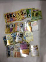 A COLLECTION OF POKEMON CARDS TO INCLUDE 50 HOLOS AND XY EVOLUTIONS