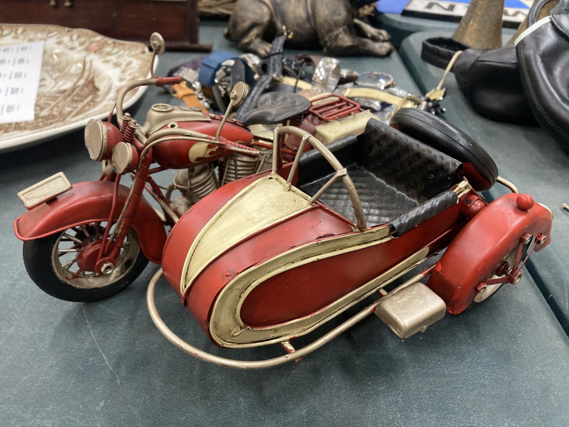 A TIN PLATE MOTOR BIKE AND SIDE CAR MODEL
