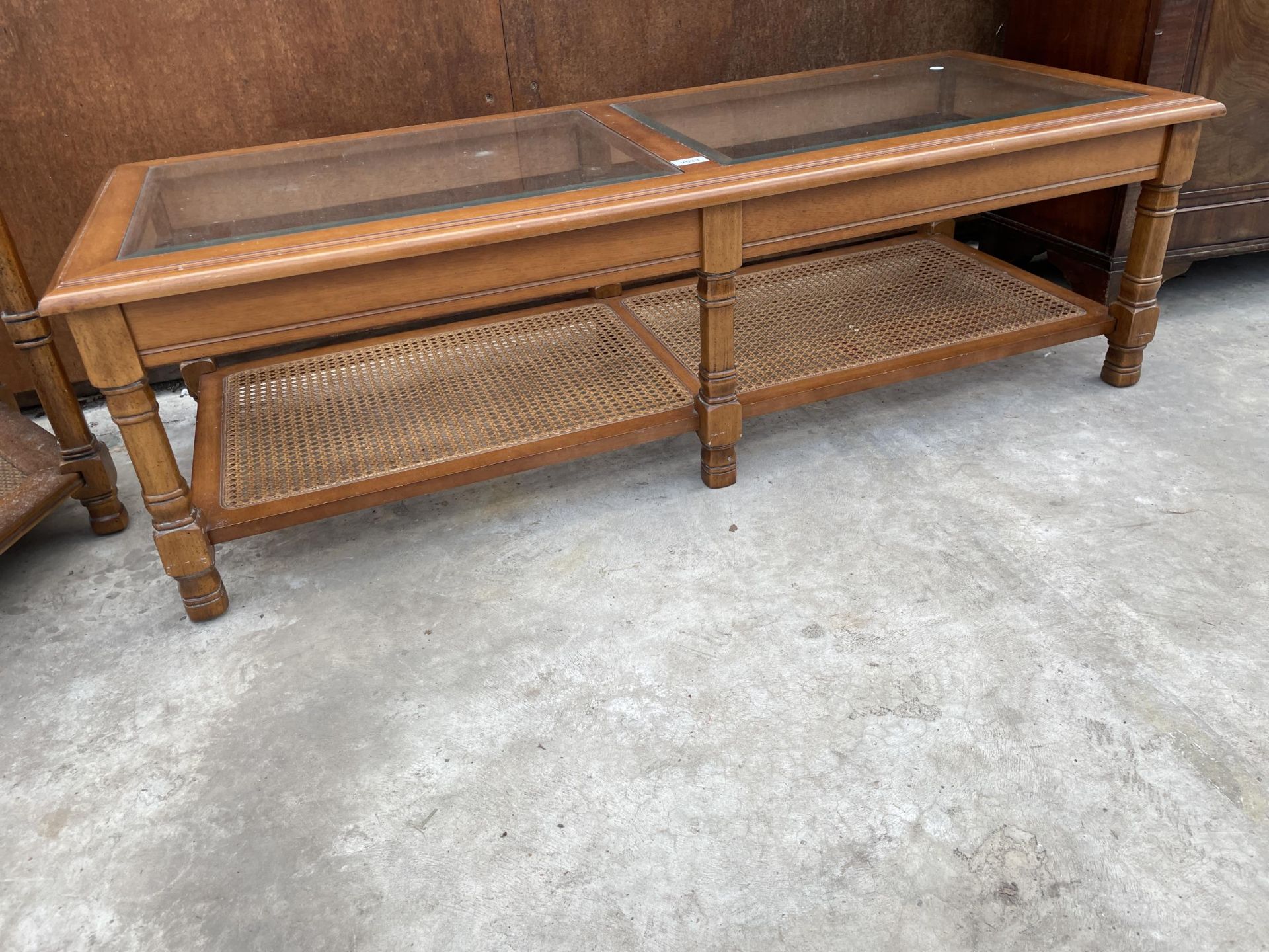 A TWO TIER COFFEE TABLE WITH INSET GLASS TOP AND CANE LOWER SHELF, 50 X 21" AND MATCHING HEXAGONAL - Image 2 of 4