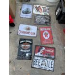 AN ASSORTMENT OF TIN SIGNS