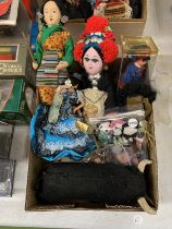 A COLLECTION OF VINTAGE DOLLS IN TRADITIONAL COSTUME, A SOFT TOY BULL PLUS A BAG OF TINY TEDDIES