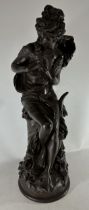A BELIEVED ALBERT-ERNEST CARRIER-BELLEUSE (1824-1887) LARGE BRONZE MODEL OF A LADY HOLDING TWO