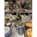 TWO VINTAGE LAMPS - CHINESE BLUE AND WHITE AND EXAMPLE WITH CAST METAL BASE