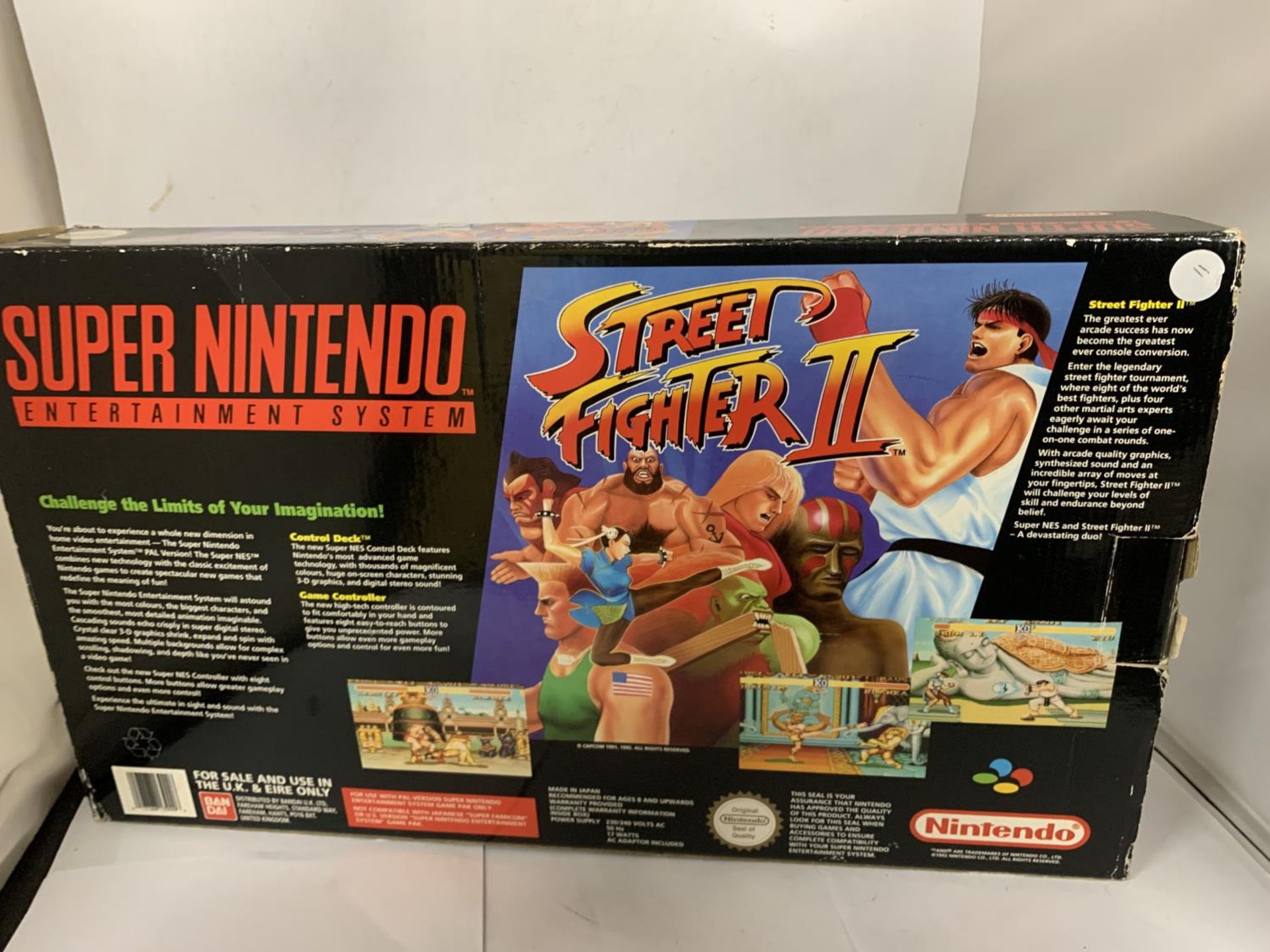 A SUPER NINTENDO ENTERTAINMENT SYSTEM INCLUDING THE WORLD'S GREATEST ARCADE HIT STREET FIGHTER II - Image 3 of 3