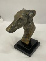 A BRONZE BUST OF A GREYHOUND HEAD ON A MARBLE BASE