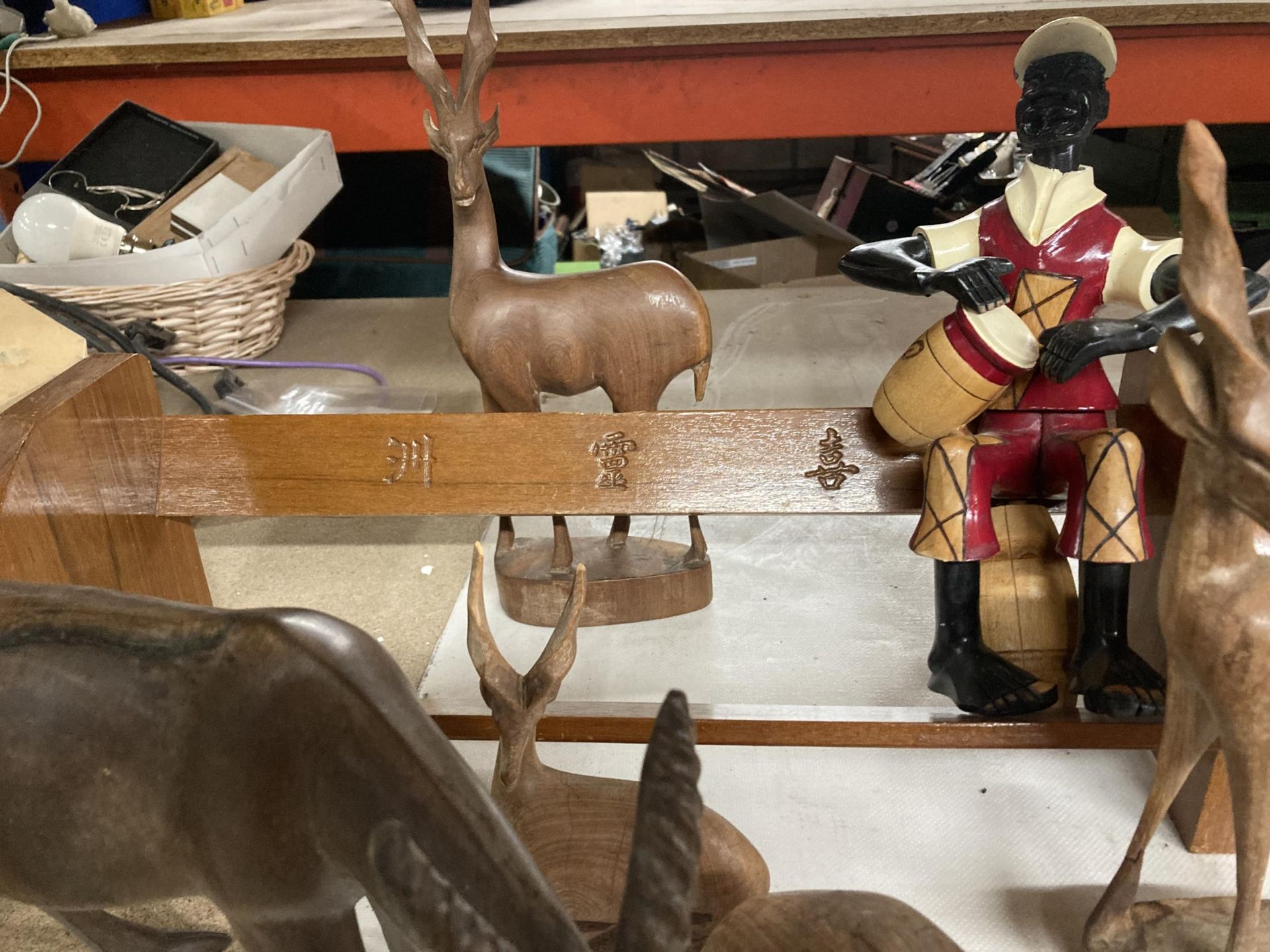 A COLLECTION OF CARVED WOODEN ANIMALS TO INCLUDE ANTELOPES, A RHINOCEROUS, ETC, A BOOK SHELF WITH - Image 7 of 7
