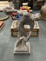 A CHROME EFFECT MODEL OF A DISCUS THROWER