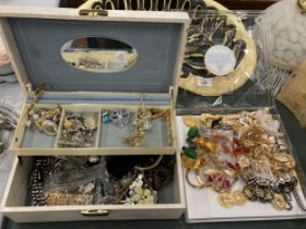 A LARGE COLLECTION OF ASSORTED COSTUME JEWELLERY IN JEWELLERY BOX AND FURTHER CASE