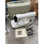 A NECCHI 544 ELECTRIC SEWING MACHINE WITH FOOT PEDAL AND CARRY CASE