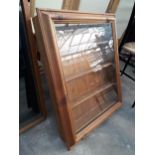 A PINE GLASS FRONTED WALL CABINET