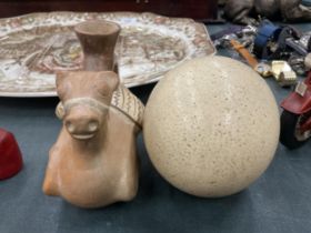 TWO ITEMS - TERRACOTTA HORSE JUG AND AN OSTRICH EGG