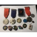 A LARGE COLLECTION OF MEDALS AND BADGES