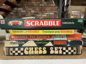 THREE SCRABBLE GAMES, ORIGINAL, TURNTABLE AND JUNIOR PLUS A SPEAR;S GAMES DRAUGHTS SET AND A CHESS