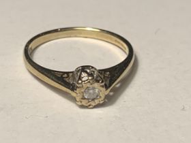 A 9 CARAT GOLD RING WITH DIAMOND SOLITAIRE SIZE K