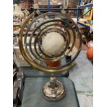 A DECORATIVE ARMILLARY SPHERE GLOBE