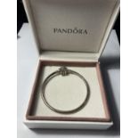 A PANDORA BANGLE IN A PRESENTATION BOX