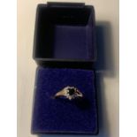 A 9 CARAT GOLD RING WITH CENTRE HEART SHAPED SAPPHIRE SURROUNDED BY DIAMONDS SIZE O/P GROSS WEIGHT