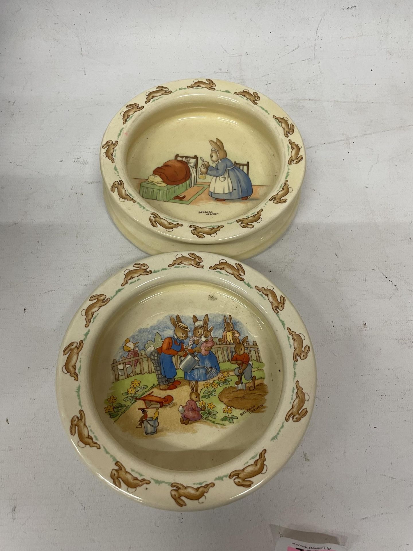 TWO ROYAL DOULTON BUNNYKINS DEEP IVORY GLAZED EARTHENWARE BABY PLATES "MEDICINE TIME" PRODUCED UNTIL