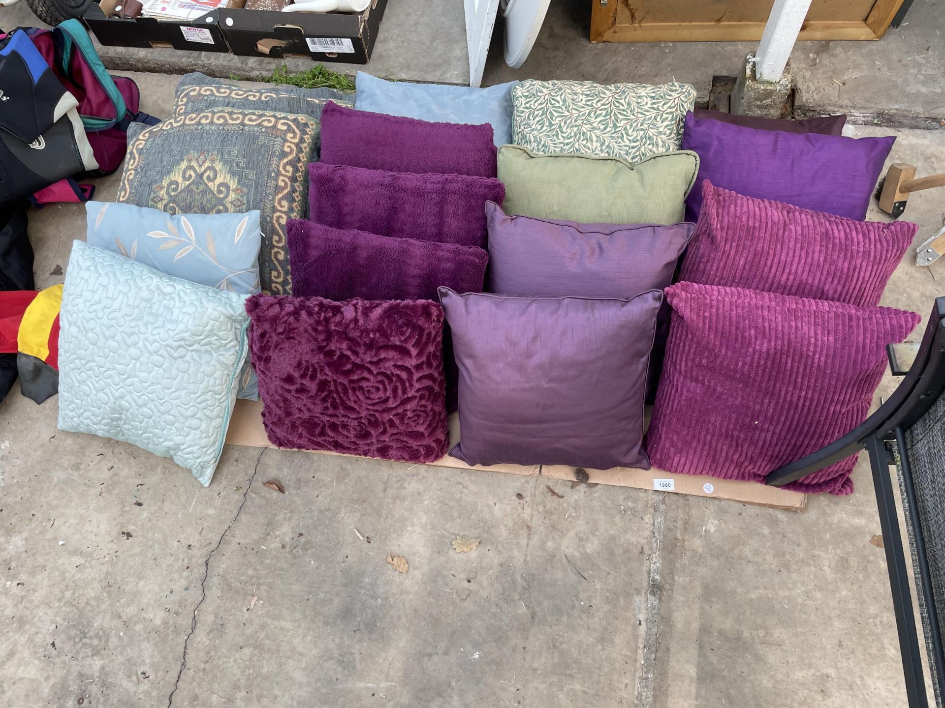 A LARGE ASSORTMENT OF SCATTER CUSHIONS