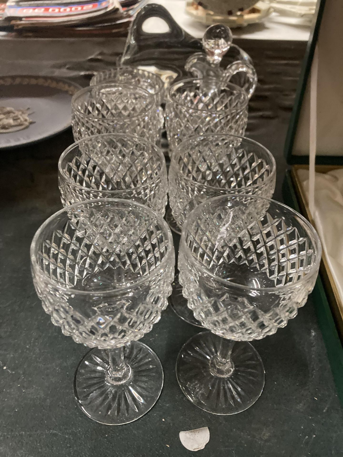 A SET OF SIX WINE GLASSES , CUT GLASS LIDDED POT, JUG AND BULL FIGURE