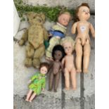 AN ASSORTMENT OF VINTAGE DOLLS AND TEDDIES