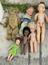 AN ASSORTMENT OF VINTAGE DOLLS AND TEDDIES