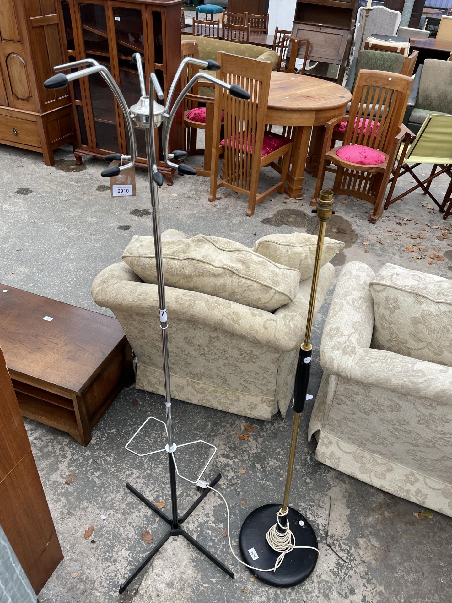 A RETRO CHROME AND BLACK METALWARE COAT STAND AND RETRO STANDARD LAMP