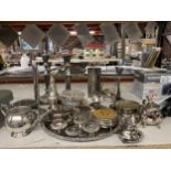 A LARGE QUANTITY OF SILVER PLATED ITEMS TO INCLUDE A CANDLEABRA, CANDLESTICKS, TRAY, ROSE BOWLS,
