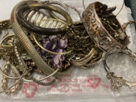 A GROUP OF COSTUME JEWELLERY BRACELETS AND BANGLES ETC