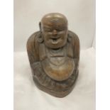 A LARGE CARVED WOODEN BUDDHA FIGURE 13" TALL