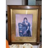 A LARGE MAHOGANY FRAMED PRINT OF A SPANISH STYLE LADY, 74CM X 91CM