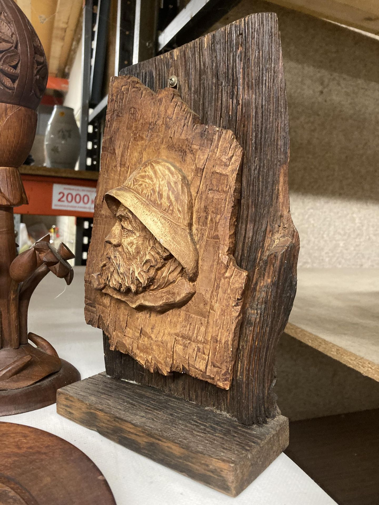 A WOODEN CARVED PLAQUE OF A FISHERMAN ON A STAND, WOODEN LOTUS LAMP, A LARGE HORN BIRD, AN - Image 3 of 9