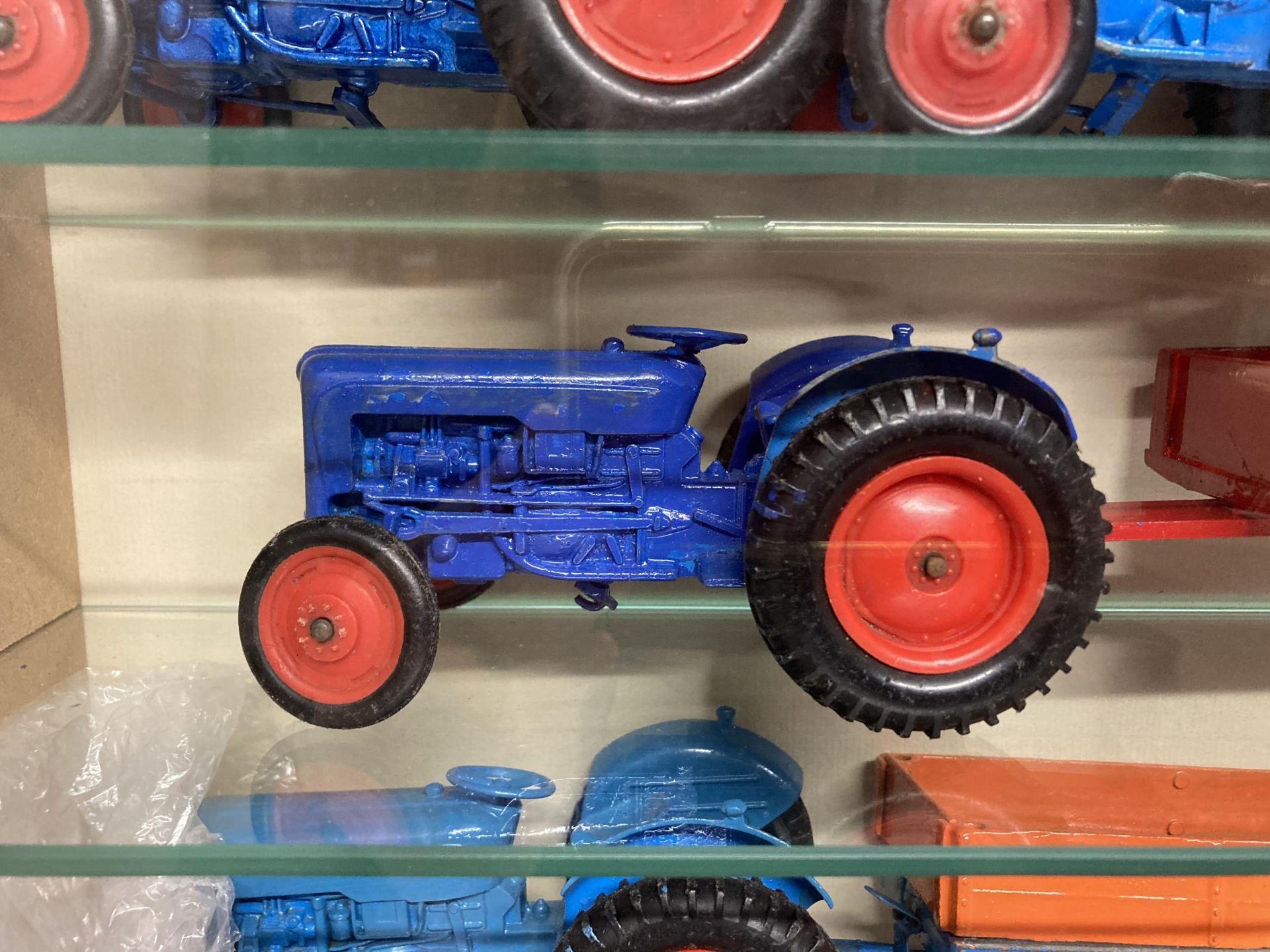 A QUANTITY OF CRENSENT TOYS IN A CABINET TO INCLUDE TEN FORD & SON DEXSTAR AND THREE TRAILERS - Image 2 of 3
