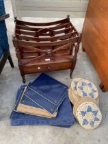 A 19TH CENTURY MAHOGANY THREE DIVISION CANTERBURY WITH SINGLE DRAWER AND QUANTITY OF MATS