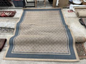 A MODERN BLUE HESSIAN RUG