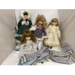A COLLECTION OF PORCELAIN HEADED DOLLS IN CSTUMES - 4 IN TOTAL