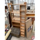 AN ASSORTMENT OF WOODEN SHELVING UNITS AND A BRASS LOG BOX