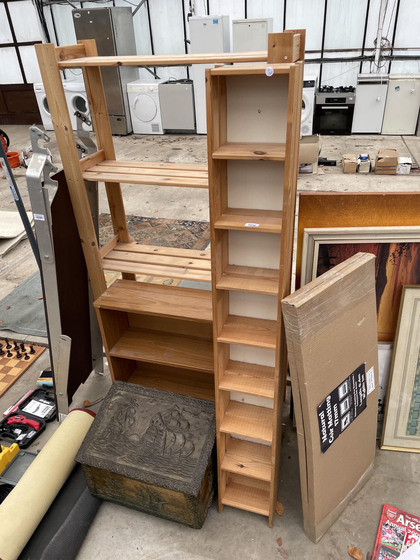 AN ASSORTMENT OF WOODEN SHELVING UNITS AND A BRASS LOG BOX