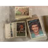 THREE PACKETS OF FOOTBALL CARDS