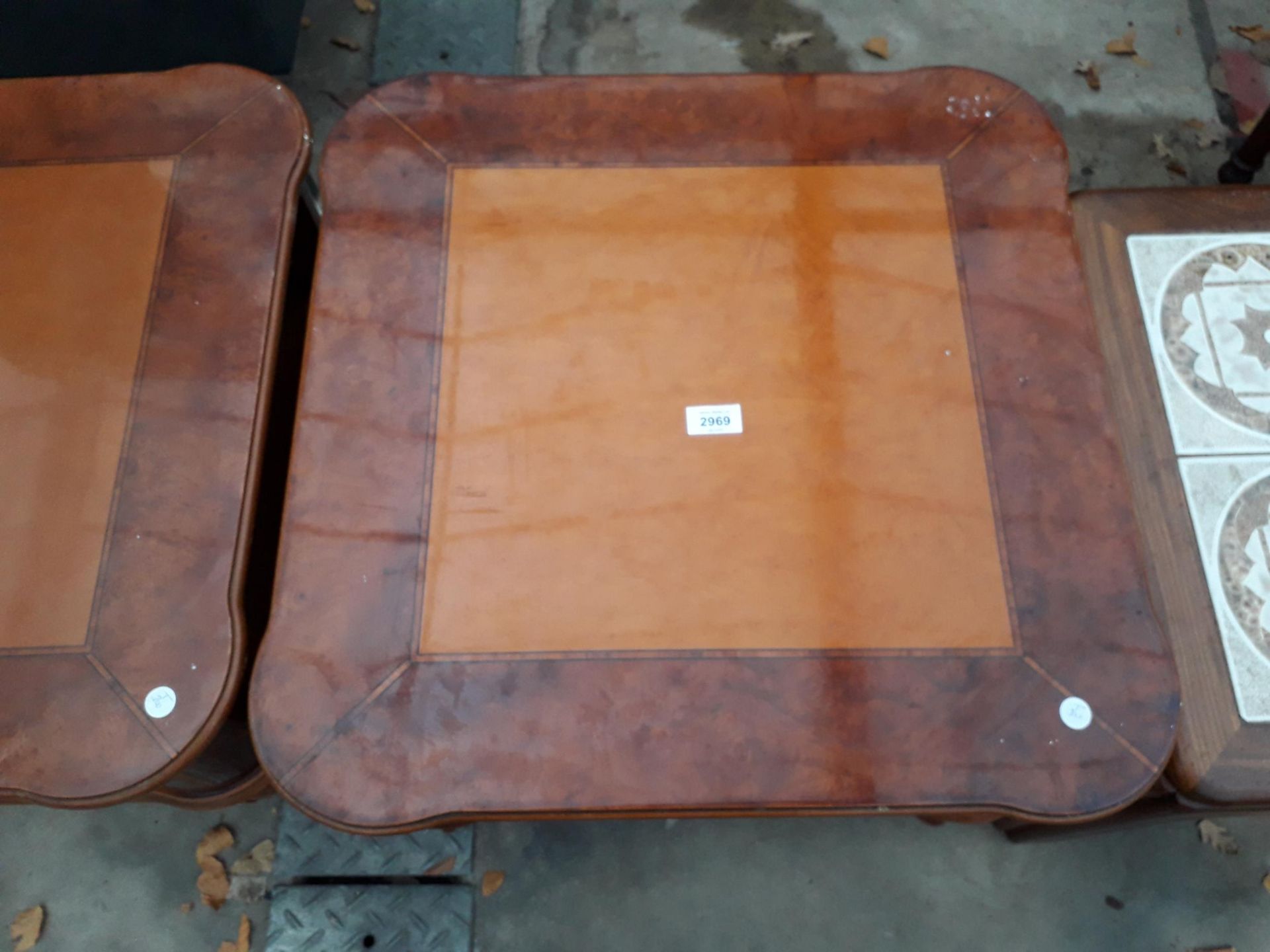 A PAIR OF BURR WALNUT LAMP TABLES WITH CANE MAGAZINE SHELF - Image 5 of 5