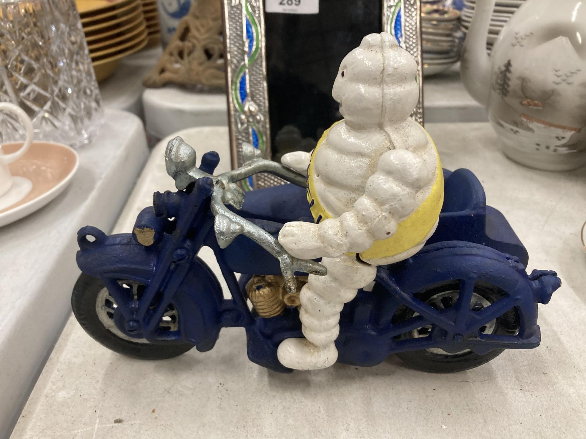 A CAST METAL MICHELIN MAN ON MOTORBIKE FIGURE - Image 4 of 5