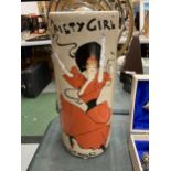 A TUBULAR CERAMIC GAIETY GIRL VASE FROM PRINCE OF WALES THEATRE, 12" HIGH