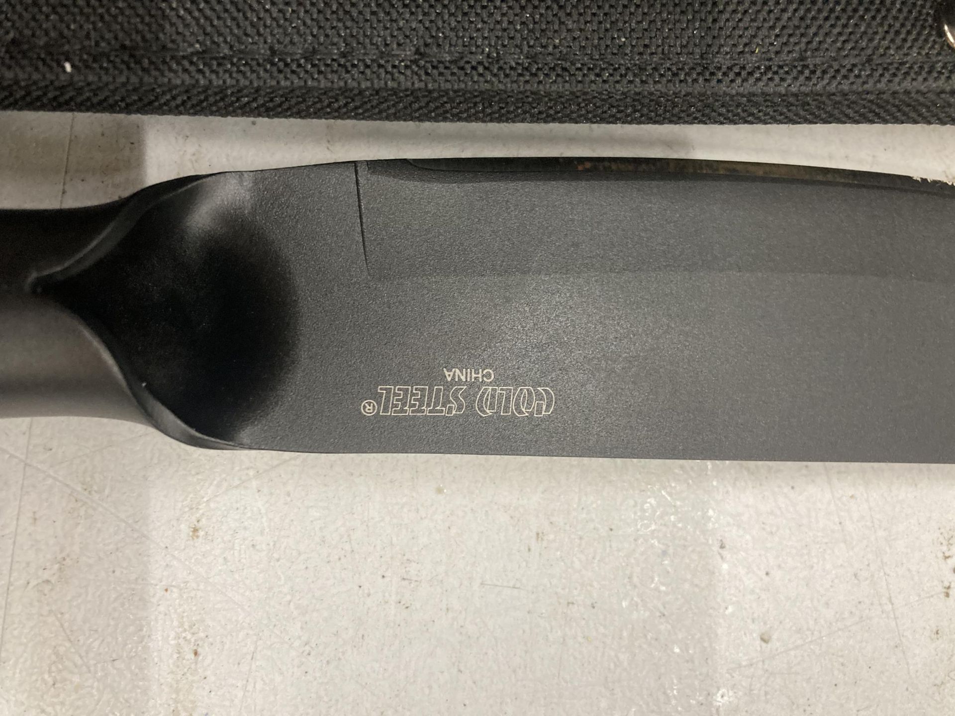 A BUSH MAN KNIFE WITH CASE AND SHARPENING TOOL - Image 4 of 4