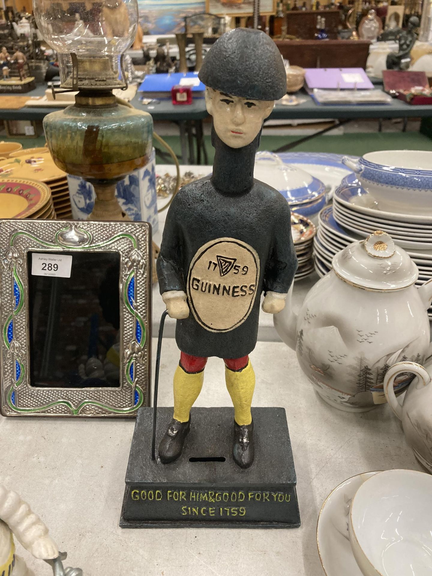 A CAST GUINNESS MAN MONEY BOX