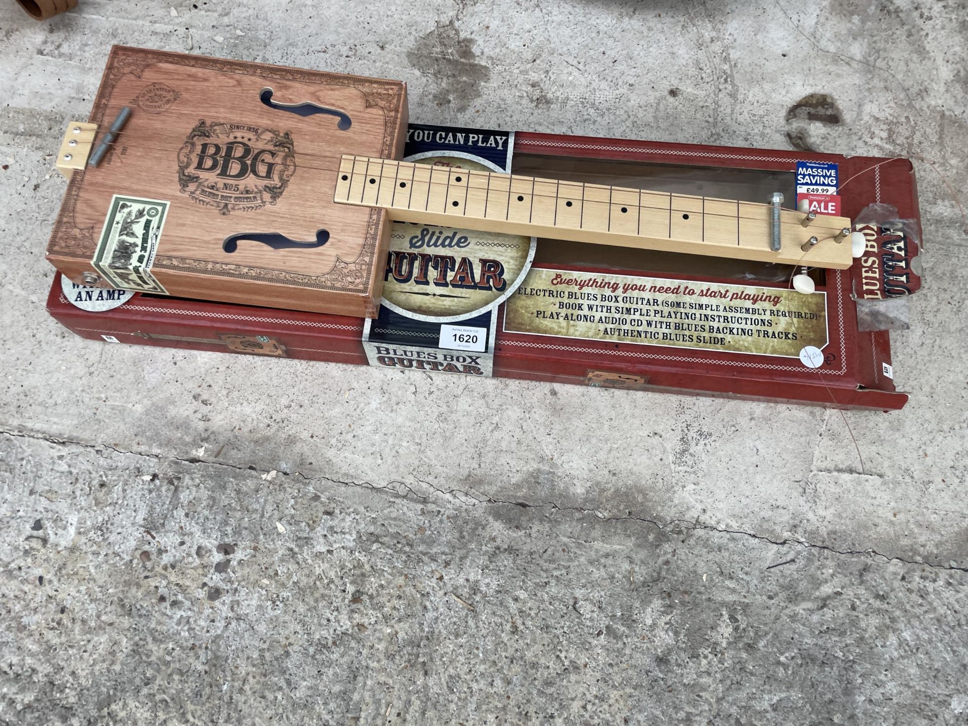 AN ELECTRIC BLUES BOX SLIDE GUITAR