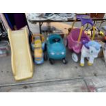 AN ASSORTMENT OF CHILDRENS RIDE ALONG VEHICLES AND A SLIDE ETC