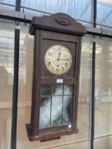 A VINTAGE WOODEN WESTMINISTER CHIMING WALL CLOCK