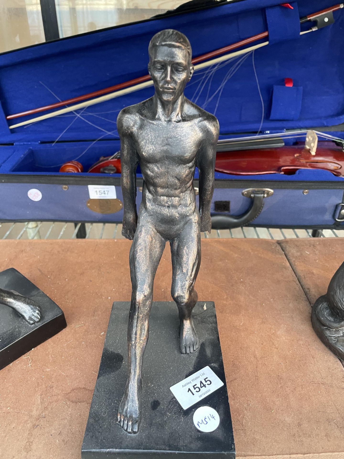 A SPELTER FIGURE OF A MALE